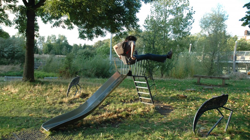 A performer in a children's playground