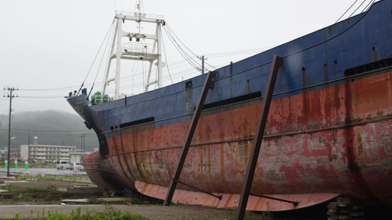 A freighter pushed inland by the tsunami